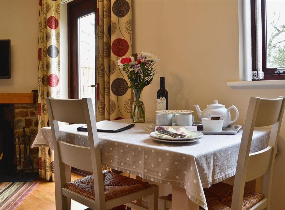 Charming dining table and chairs at The Bothy in Bradworthy, near Bude, Devon