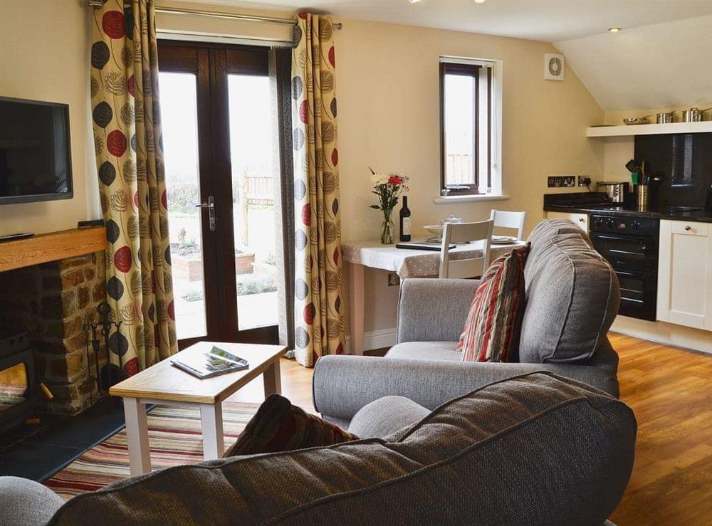 Comfortable open plan living area at The Bothy in Bradworthy, near Bude, Devon