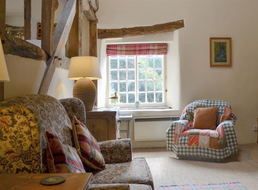 Cosy, rustic style living room at The Bothy in Bucknell, Shropshire