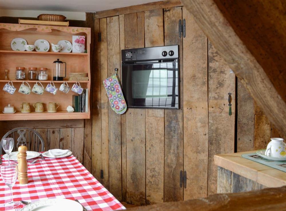Quaint kitchen/ dining area at The Bothy in Bucknell, Shropshire