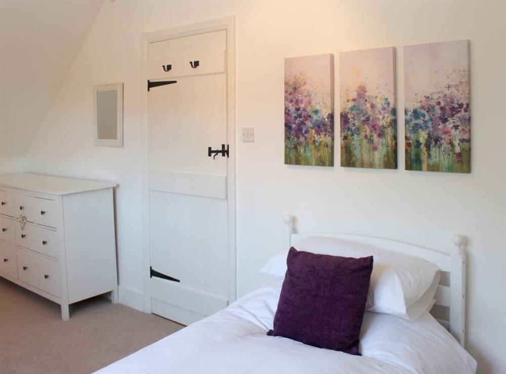 Roomy twin bedroom at The Bothy in Lymington, Hampshire