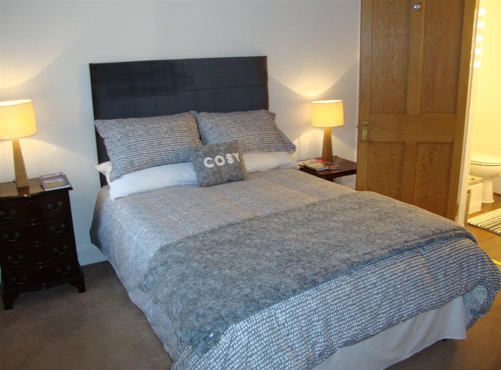 Double bedroom with eh-suite and walk in wardrobe at The Bothy in Walkerburn, near Peebles, The Scottish Borders, Peebleshire