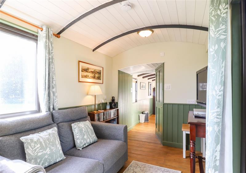 Relax in the living area at The Brake Wagon at High Barn Heritage, Greenstead Green near Halstead