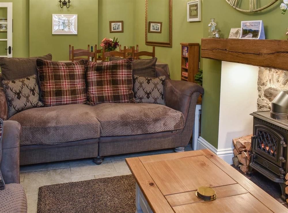 Living room/dining room at The Bridge Cottage in Llanrwst, Gwynedd