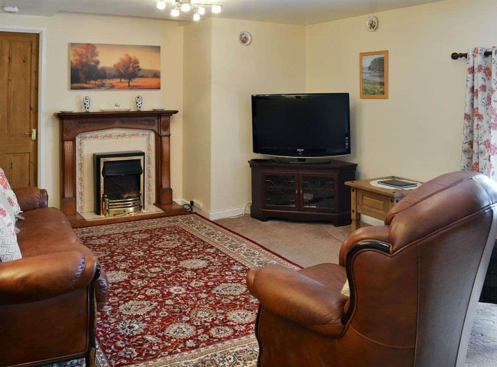 Cosy lounge area at The Bridge Inn Flat in Bridgerule, near Bude, Devon