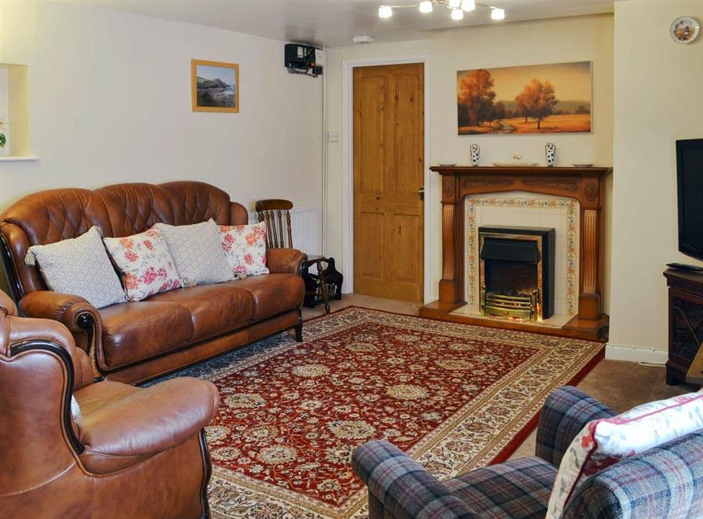 Spacious living room with dining area at The Bridge Inn Flat in Bridgerule, near Bude, Devon