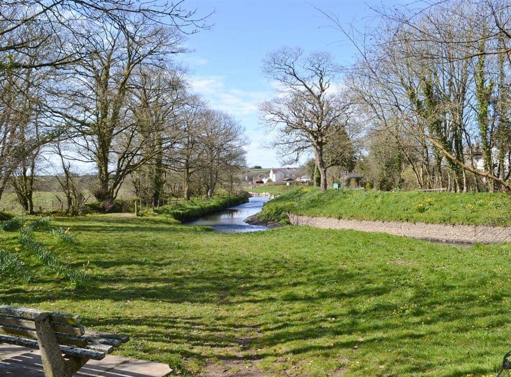 The Tamar River runs past the property at The Bridge Inn Flat in Bridgerule, near Bude, Devon