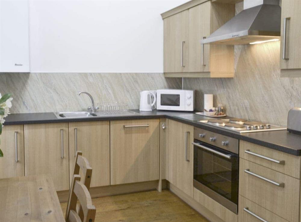Fully-equipped kitchen with dining area at The Bridles  in Lincolnshire Wolds, near Market Rasen, Great Britain