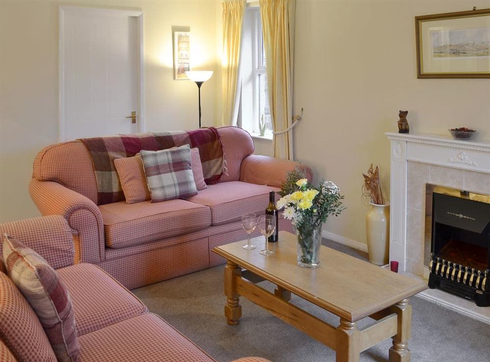 Comfortable living room at The Bungalow in Aviemore, Speyside, Inverness-Shire