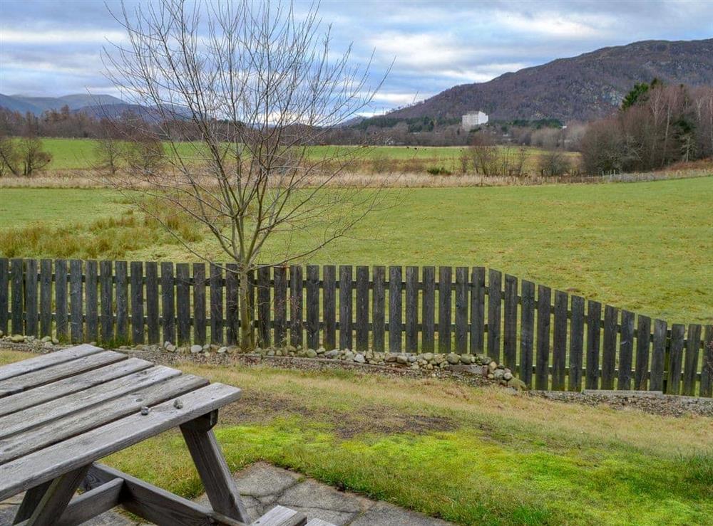 Garden with wonderful views of the surrounding area at The Bungalow in Aviemore, Speyside, Inverness-Shire