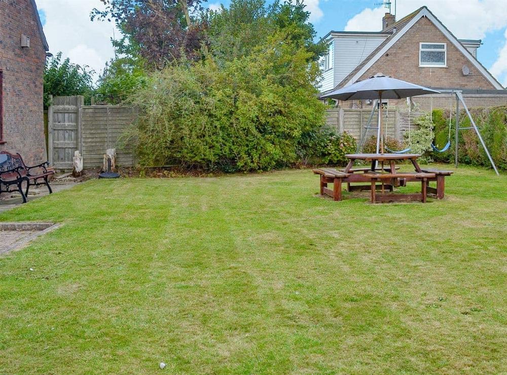Spacious, lawned garden at The Bungalow in Lebberston, near Filey, North Yorkshire
