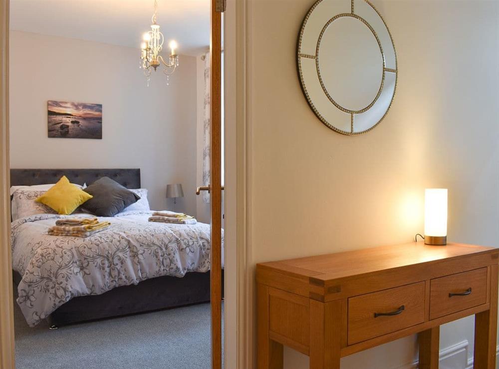 Comfortable bedroom with kingsize bed at The Bungalow in Whitby, North Yorkshire