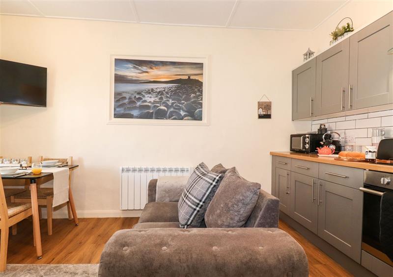 Relax in the living area at The Butchers Flat, Seahouses