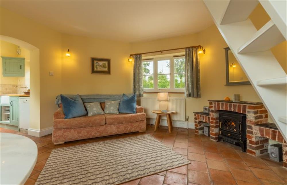Ground Floor: Sitting room electric fire adds extra warmth at The Buttery, Honingham near Norwich
