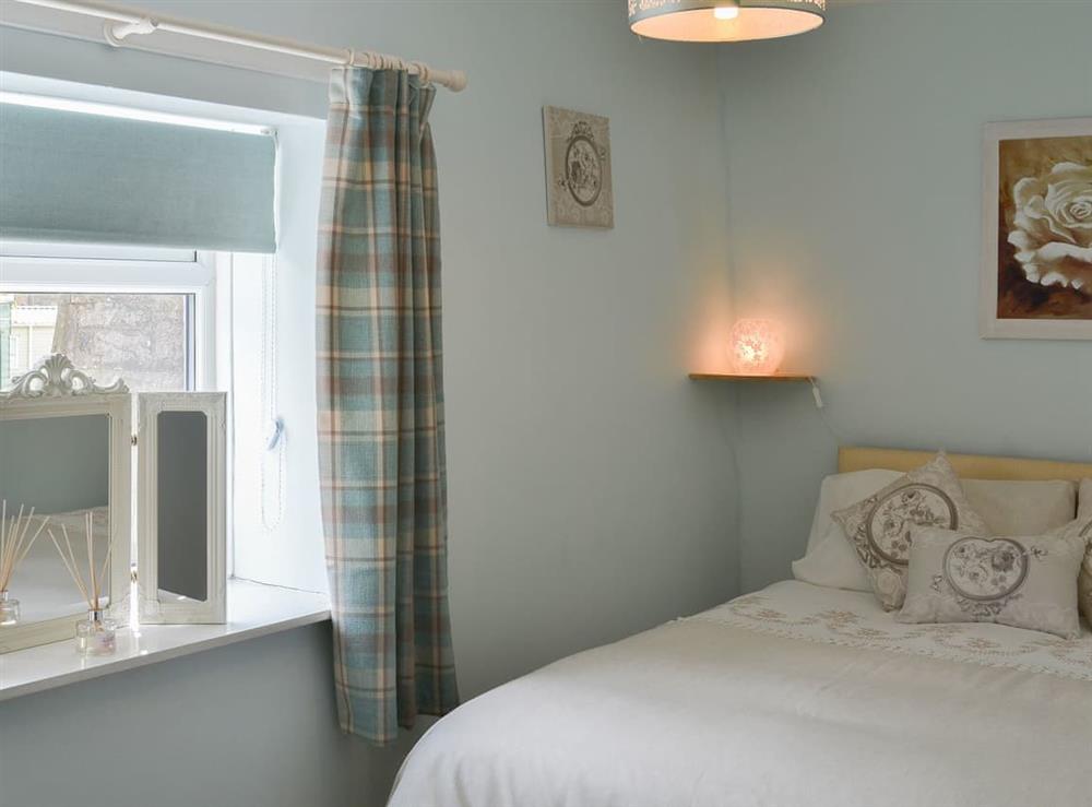 Warm and welcoming double bedroom at The Butts Cottage in Stanhope, County Durham, England