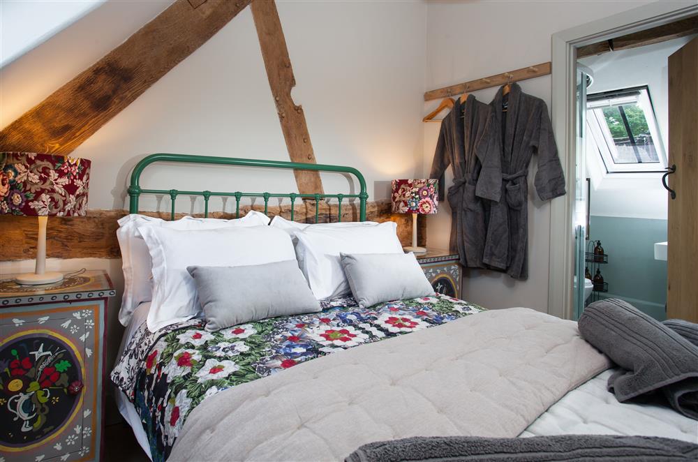 Bedroom one leading to the en-suite shower room at The Byre, Bridgnorth