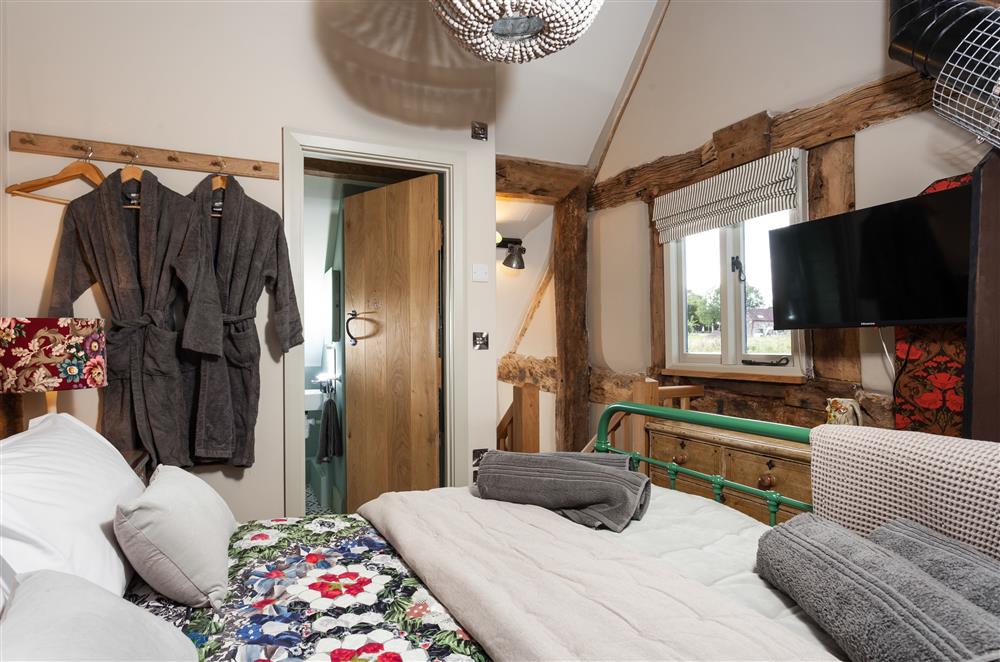 Relax in the comfort of bedroom one at The Byre, Bridgnorth
