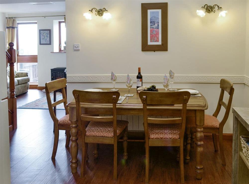 Convenient dining area at The Byre Cottage in Cannee, near Kirkcudbright, Dumfries and Galloway, Kirkcudbrightshire