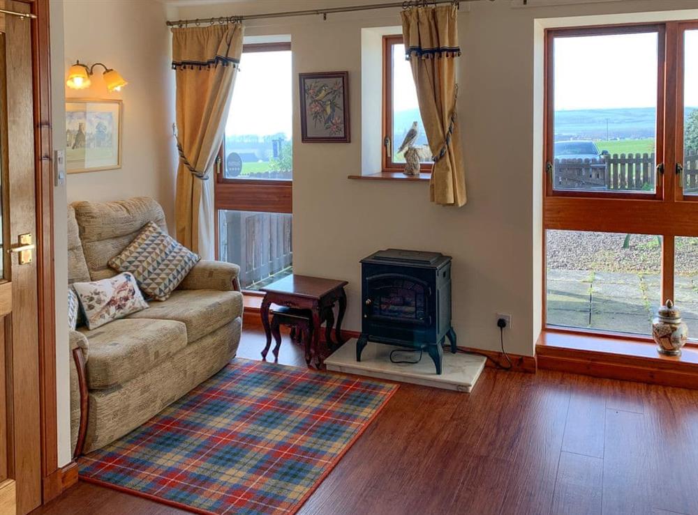 Living area at The Byre Cottage in Cannee, near Kirkcudbright, Dumfries and Galloway, Kirkcudbrightshire