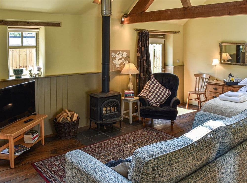 Open plan living space (photo 2) at The Byre in Helmsley, North Yorkshire