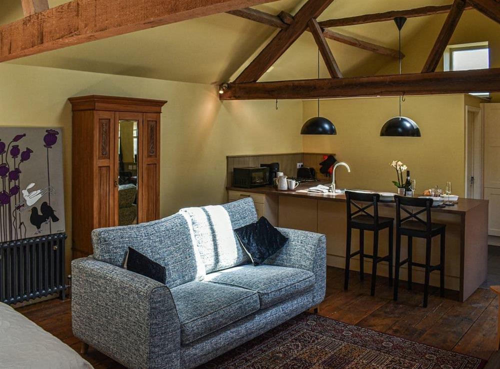 Open plan living space (photo 4) at The Byre in Helmsley, North Yorkshire