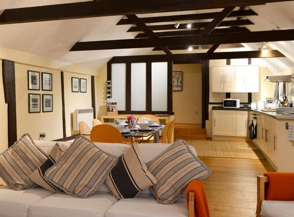 Spacious, beamed open-plan living space at The Byre in Ninfield, Nr Battle, East Sussex., Great Britain