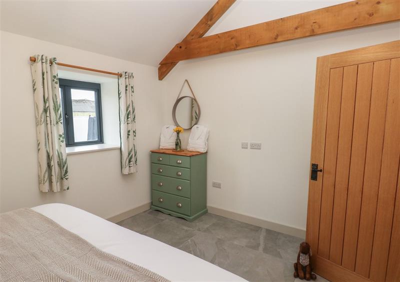 A bedroom in The Byre at The Byre, St Brides Major