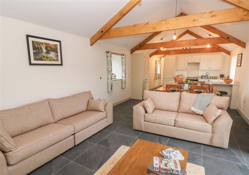 Relax in the living area at The Byre, St Brides Major