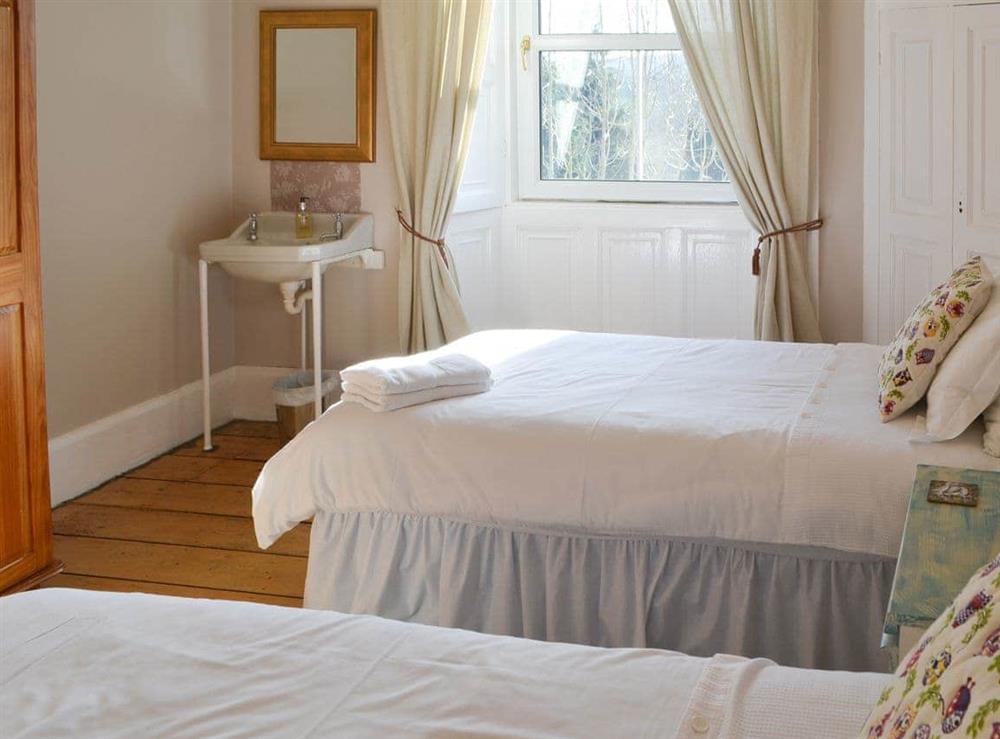 Pretty twin bedded room at The Byrness in Byrness Village, near Otterburn, Northumberland