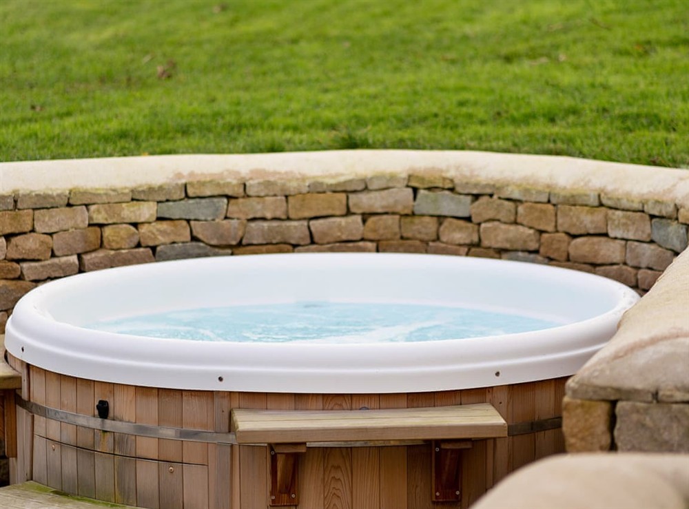 Hot tub at The Cabin at Hill Rise in Bourton-on-the-Water, Gloucestershire
