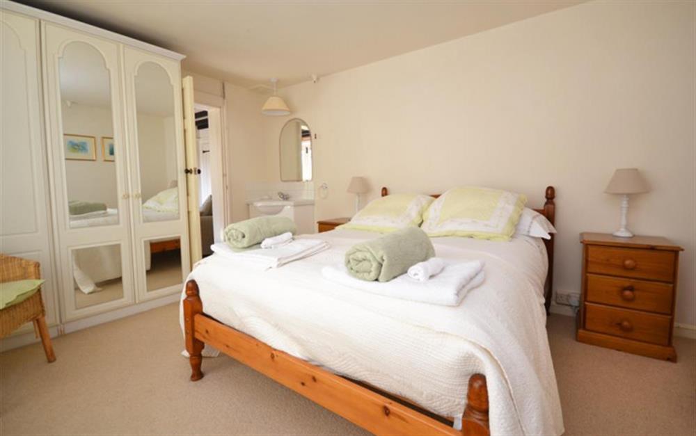 The ground floor bedroom with stunning views at The Cabin in Frogmore