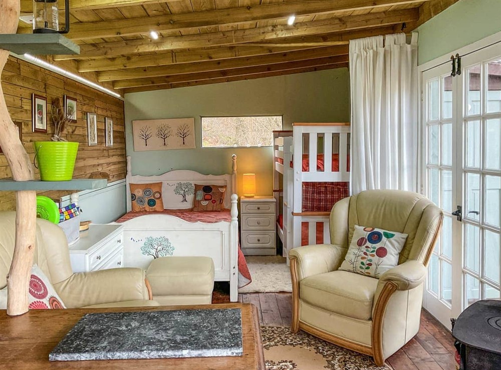 Living area at The Cabin In The Woods in Llanybydder, near Llandovery, Dyfed