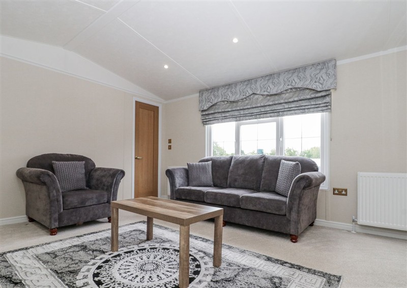 Relax in the living area at The Cabin, Thornton Dale