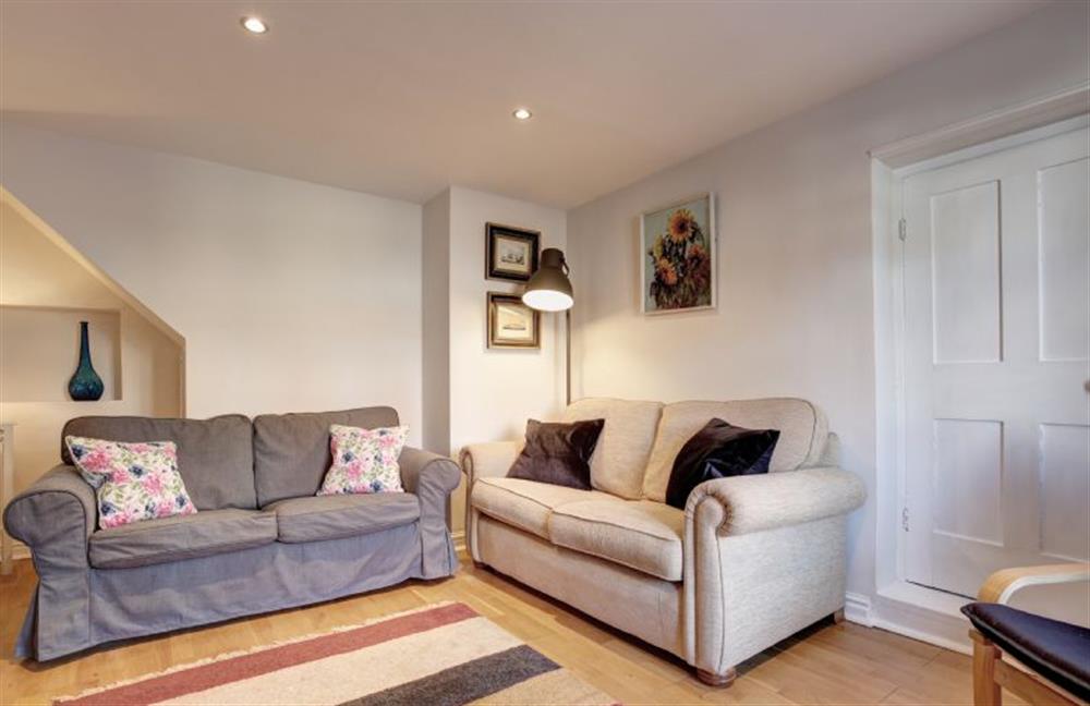 Ground floor: Sitting room with comfortable seating (photo 2) at The Cabin, Wells-next-the-Sea