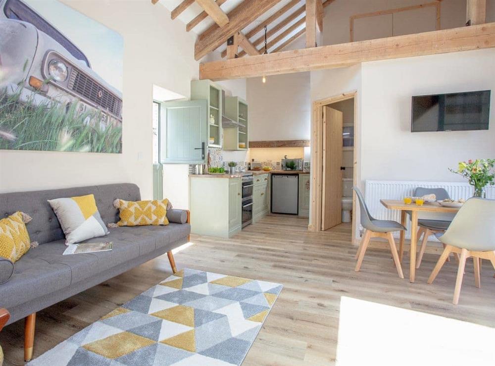 Open plan living space at The Calving Barn in Bratton Fleming, Devon