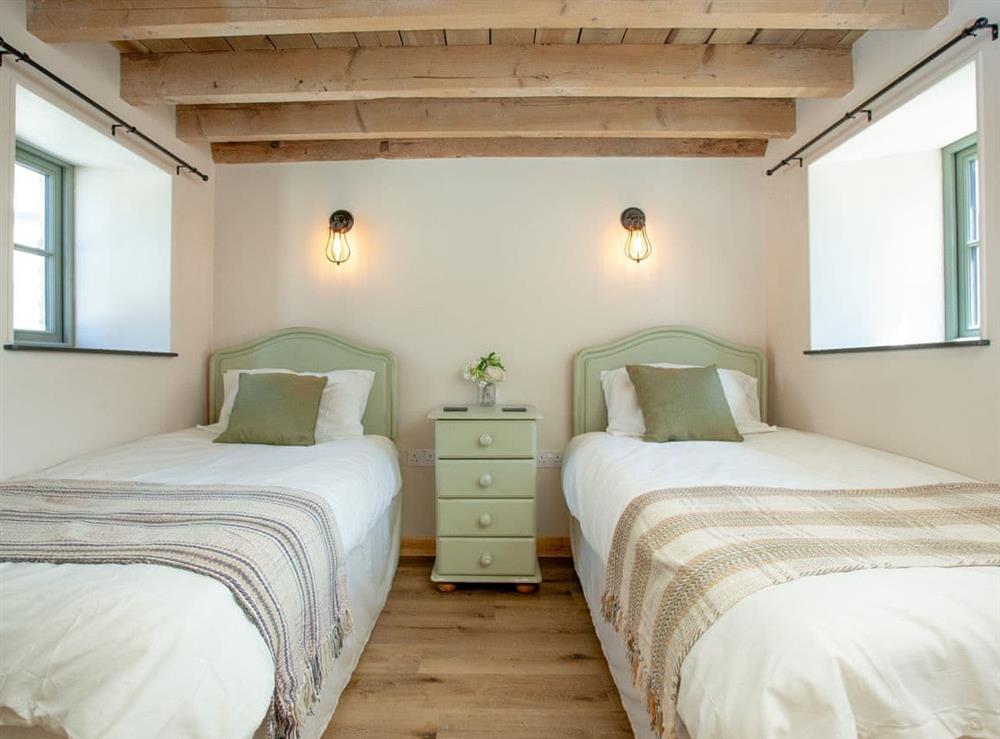 Twin bedroom at The Calving Barn in Bratton Fleming, Devon