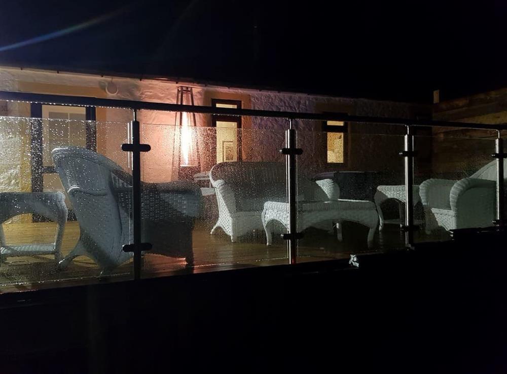 The hot tub at night at The Calving Shed in Near Neilston, Lanarkshire