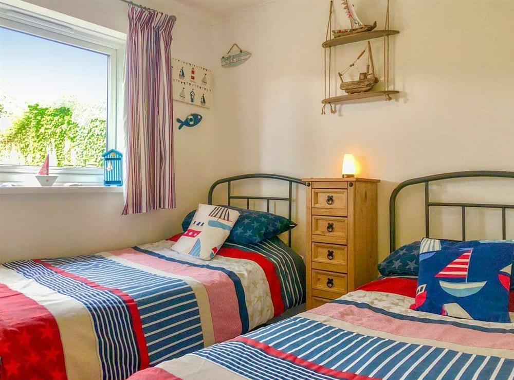Twin bedroom at The Captains Cabin in Brixham, Devon