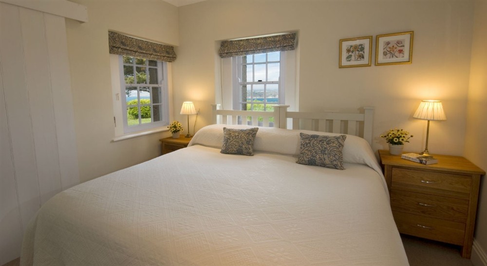 The double bedroom, which can also be a twin on request, at The Captain's Quarter in Roseland, Cornwall