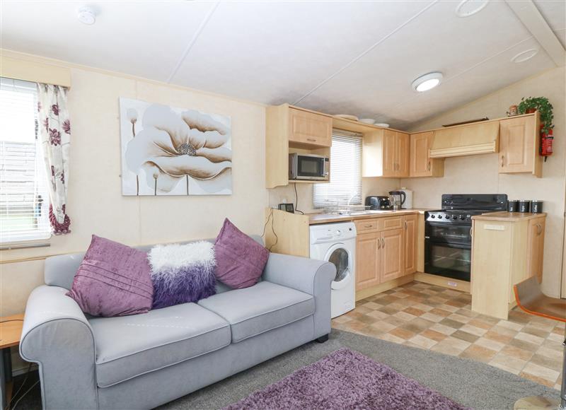Relax in the living area at The Caravan @ Llettyr Wennol, Cemaes Bay