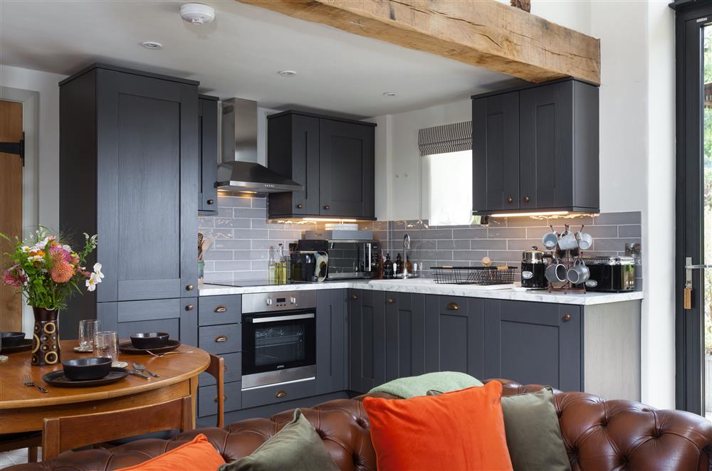 Well-equipped kitchen with an electric oven and hob and Krupps Nespresso coffee machine at The Cart House, Bridgnorth