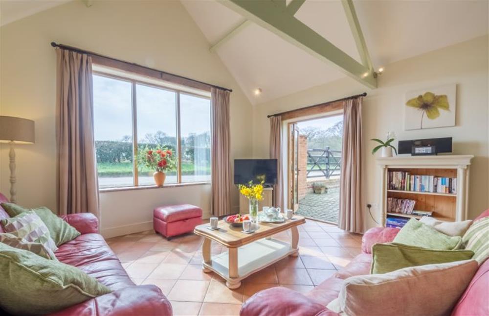 Ground Floor: Sitting room with doors to the outside at The Cart Lodge, Great Massingham near Kings Lynn