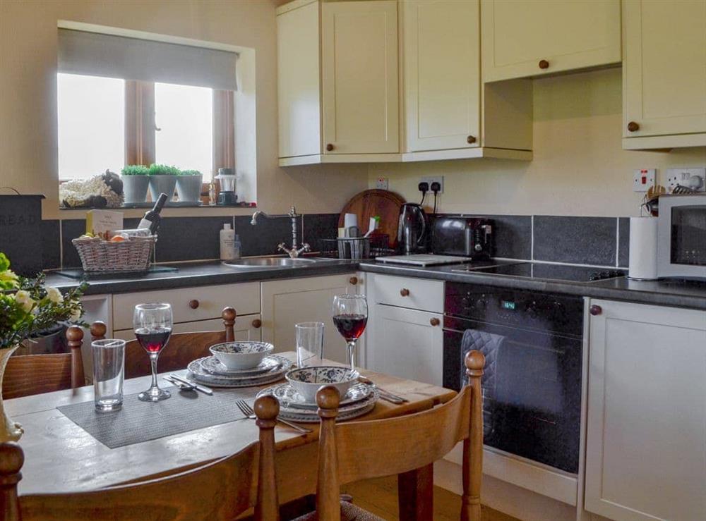 Well equipped kitchen/ dining room at The Cart Lodge in Hooe, Battle, East Sussex., Great Britain