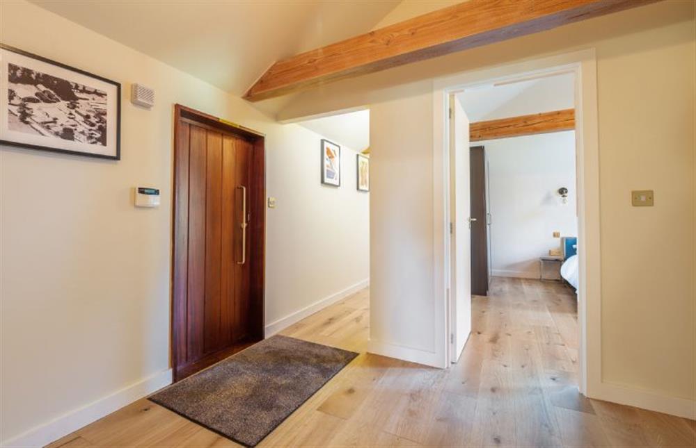 Hallway leading to two bedrooms and the shower room at The Cart Lodge, Thornham Magna