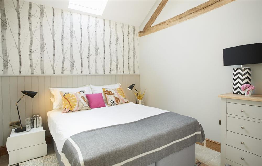 Spacious bedroom with a double zip and link bed and en-suite shower room at The Cart Shed, Downton-on-the-Rock