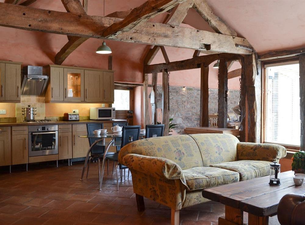 Open plan living space with wood beams at The Cart Shed in Knapton Green, near Leominster, Herefordshire