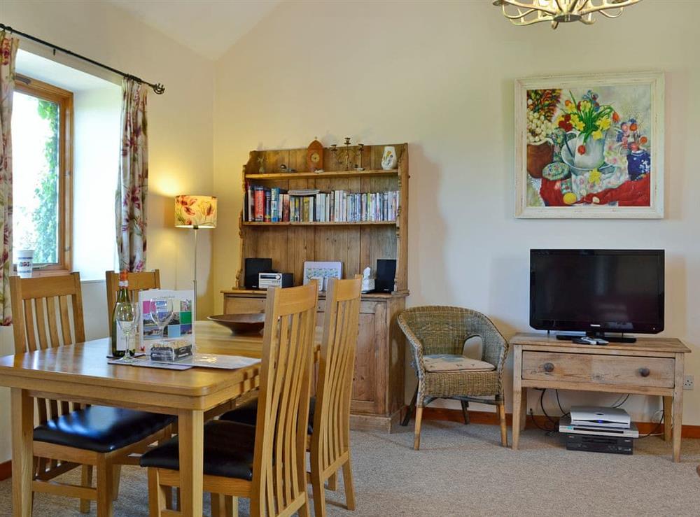 Beautifully presented open plan living space with beams at The Cart Shed in Saxmundham, Suffolk