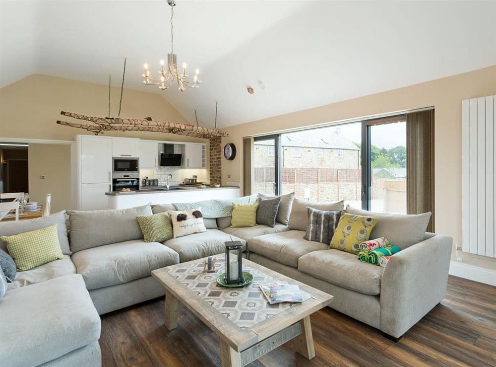 Stylishly furnished open plan living space at The Cart Shed in Witton Gilbert, near Durham, England
