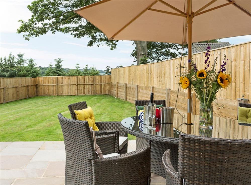 Superb enclosed lawned garden with patio at The Cart Shed in Witton Gilbert, near Durham, England