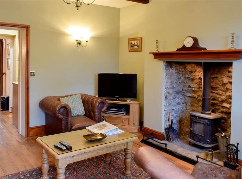 Beamed living room with Karndean floor at The Carters Cottage in Sedgwick, near Kendal, Cumbria